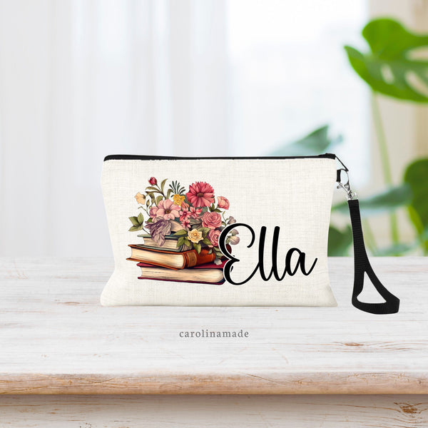 Book stacked floral book lover zipper pouch. Personalized with name