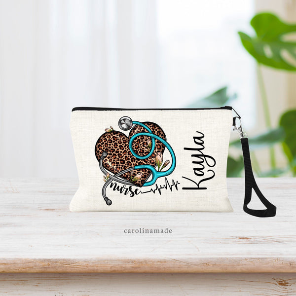 This bag features a leopard print heart with a blue stethoscope over it with flowers. Personalized with name on the side.