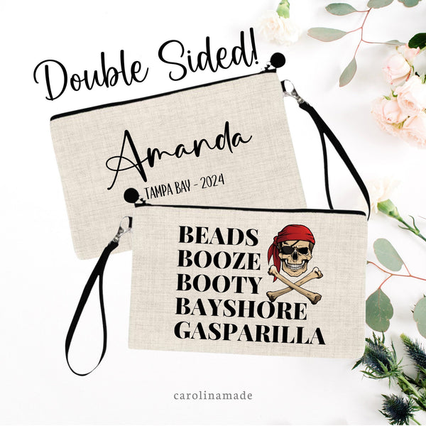 Personalized Gasparilla Wristlet. One side has Text that says Beads, Booze, Booty, Bayshore, Gasparilla. With a Scull & Bones Pirate. The other side is personalized with Name and Tampa Bay - 2024