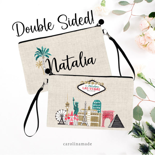 Personalized Las Vegas Wristlet Purse or Makeup Bag. One side has watercolor Vegas Skyline with Welcome to Fabulous Las Vegas Nevada Welcome Sign. The other side is personalized with your name and a palm tree beside it. Perfect for girls trip!