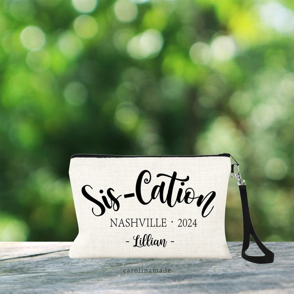 Minimalist style design with the text Sis-Cation in script, the destination and date under it. And then your name personalized on the bottom. All text in black color.