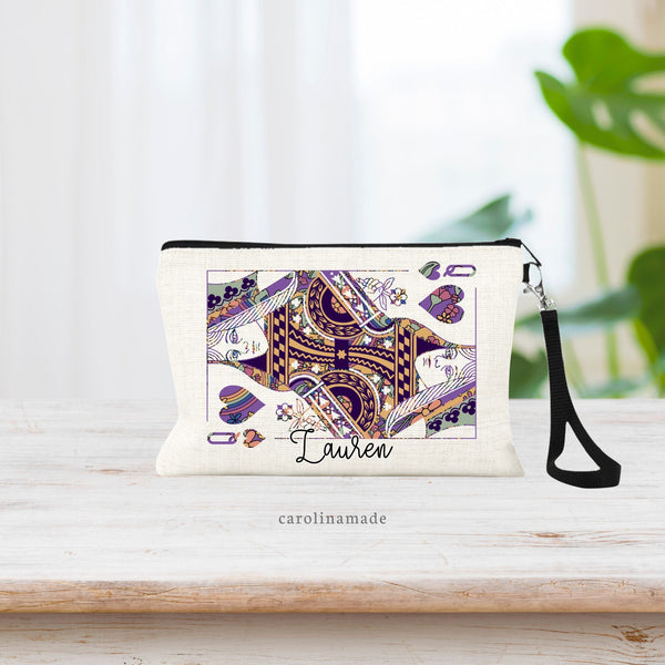 This linen wristlet features a colorful floral Queen of Hearts Design and is personalized with your name at the bottom.