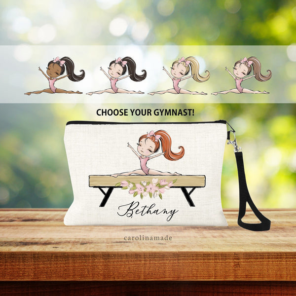 This linen wristlet features a custom girl on the gymnastics beam. Girl skin tone & hair color can be chosen. Beam has pink flowers under it. And the child's name is personalized at the bottom.