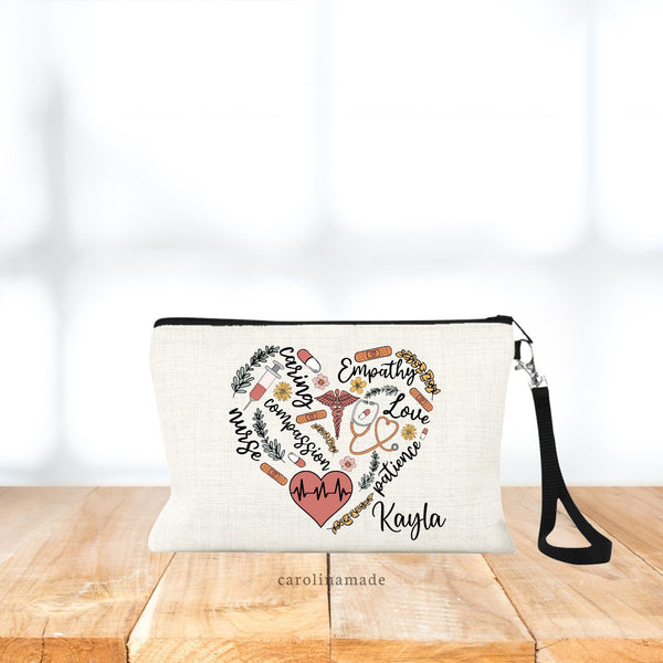 This beautiful bag has text & icons in the shape of a heart. Words like: caring, compassion, empathy, love, patience, nurse.  And the icons are flowers, greenery, bandages, needle, pills, stethoscope, medical symbol. A name is personalized in corner.