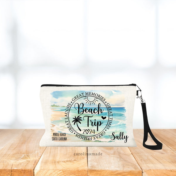 This linen wristlet features a beautiful beach scene background with a center circle that says Beach Trip. Great memories, great times, great friends, great laughs. Add your name and destination to personalize it.