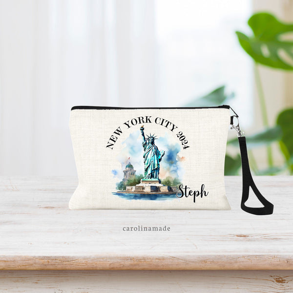 This linen bag features a watercolor design of the Statue of Liberty. At the top it says New York City 2024 and the bottom right corner is personalized with your name.