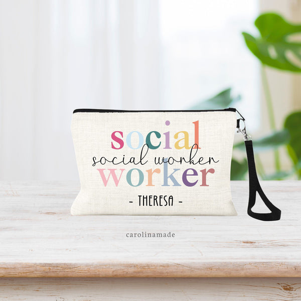 This linen wristlet features the words social worker in all individual colors with social worker in script over top of it. The bottom us personalized with your name.