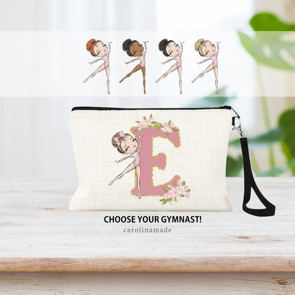 This beautiful small makeup type back with black strap features a large letter initial in the background. Center is pink with a gold outline. Next to the letter is a gymnast which you can personalize. And flowers on the letter also.
