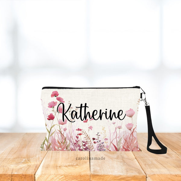 This linen zipper pouch has a beautiful watercolor pink wildflower design along the bottom border of the bag. The center is personalized with your name. The perfect gift for Mom this Mother's Day!