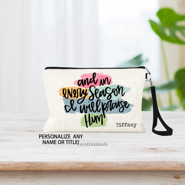 This linen pouch features the text: and in every season I will praise Him in a handwritten script font with many colors brush stroked behind the text. Opt to personalize the bag with your name in the bottom right corner.