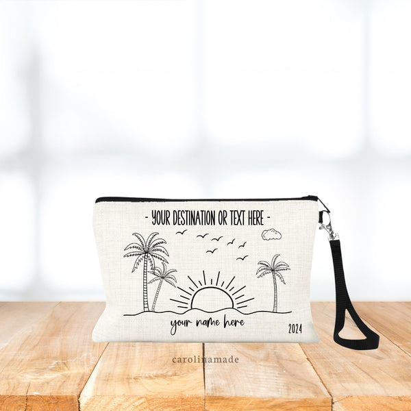 This linen wristlet features black line art design of beach, sun setting, palm trees, cloud and birds. Personalize the top with your destination or event and add your name and date at the bottom.