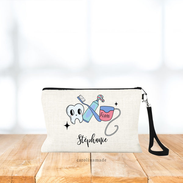 This natural linen zipper pouch features art at the top - tooth paste, floss, tooth & tooth brush. Personalization at the bottom. Perfect for kids dental bag or company logo bags