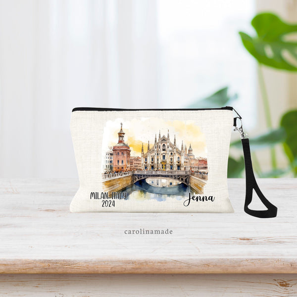 Beautiful watercolor design of Milan Italy in the middle of this linen wristlet bag.  It is personalized with your name on bottom right, with Milan Italy and the year on the bottom left.