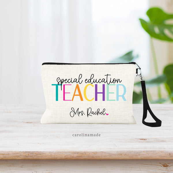 This linen zipper pouch features the word TEACHER in big colorful letters in the center. With special education in a black script font above it. Personalize the bottom with your favorite SPED Teacher Name!
