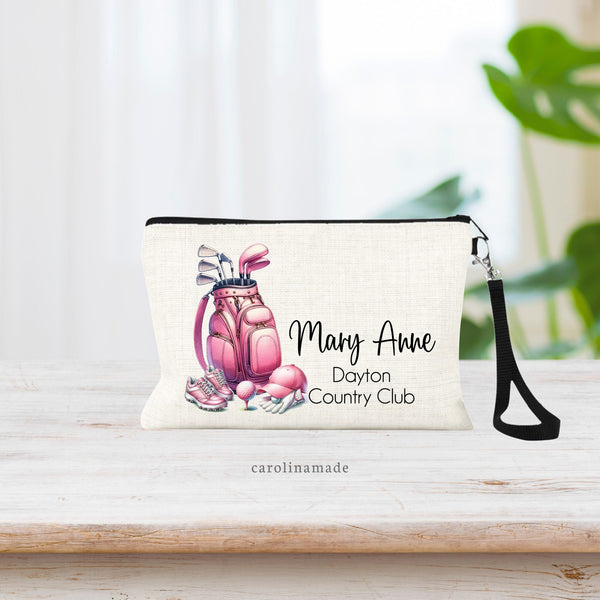 Linen zipper pouch with pink golf bag, pink shoes, pink ball, pink hat and gloves. Personalized with your name and country club.