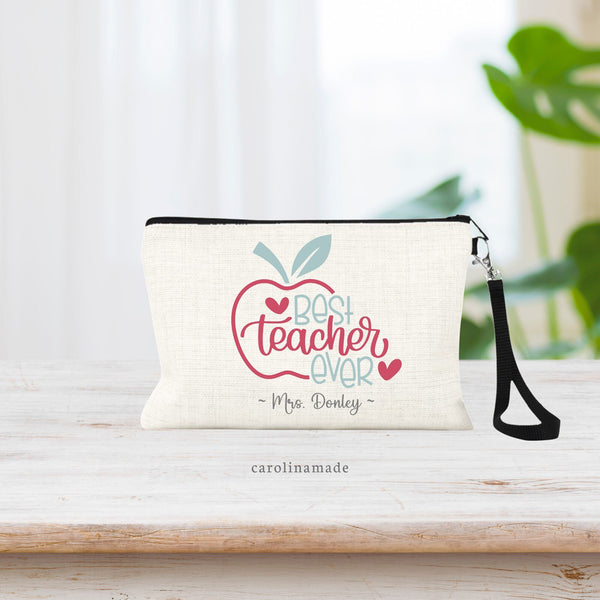 This linen zipper pouch makes the perfect teacher gift! It features an apple with the text Best Teacher Ever. Personalize the bottom with your teachers name!