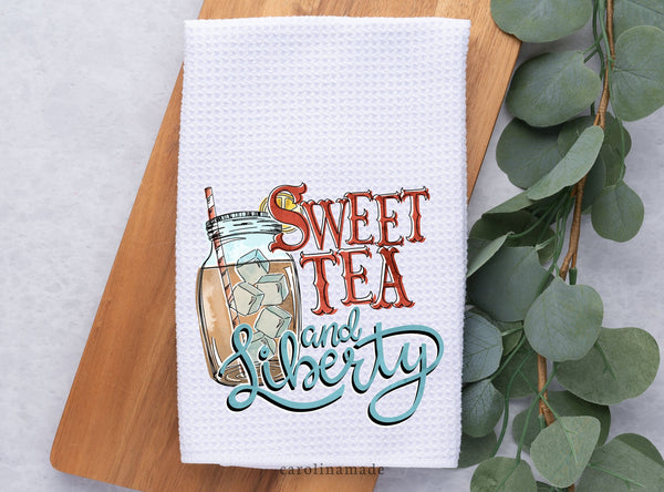 Add a southern touch to your kitchen decor with this Sweet Tea and Liberty kitchen hand towel. Featuring a mason jar with tea and ice on a white waffle weave towel.