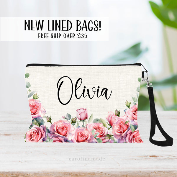 This zipper pouch features pink and purple rose flowers along the bottom border and is personalized at the top with your name. Perfect gift for June Birthdays!