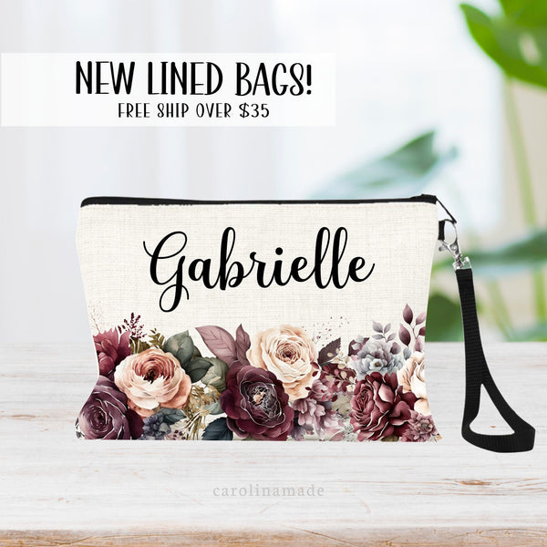 This zipper pouch features burgundy flowers along the bottom border and is personalized at the top with your name. Perfect gift for June Birthdays or Fall Rose Weddings!