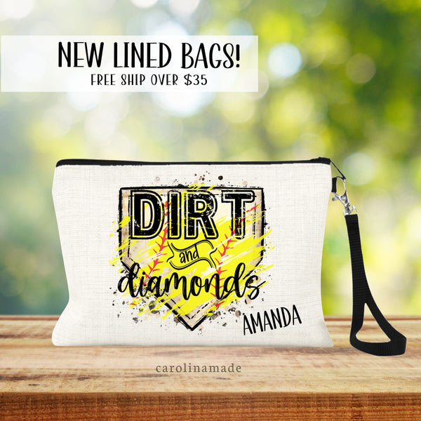 This linen wristlet features the text Dirt and Diamonds with softball design. It is personalized with your name in the bottom right corner.