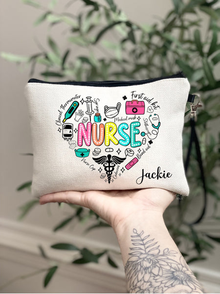 This beautiful bag has text & icons in the shape of a heart. Icons are medical related - bandages, needle, pills, stethoscope, medical symbol. With the word NURSE in the center in colorful text.  A name is personalized in corner.