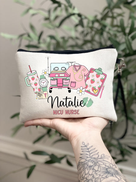 This linen zipper pouch is the perfect gift for any nicu nurse! It features fun trendy pink and strawberry art of a tumbler, nicu badge, ICU infant cart, scrubs and clipboard. Personalize with your name at the bottom.