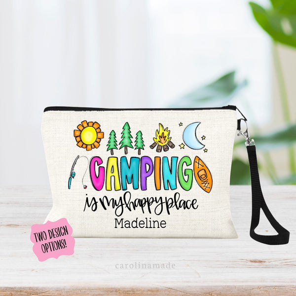 Bright colorful zipper pouch with the text Camping is my happy place. With Sun, trees, campfire, moon, stars, kayak, and fishing pole. Personalize the bottom with your name.