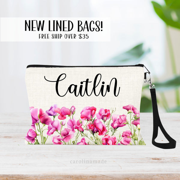 This zipper pouch features pink sweet pea flowers along the bottom border and is personalized at the top with your name. Perfect gift for April Birthdays!