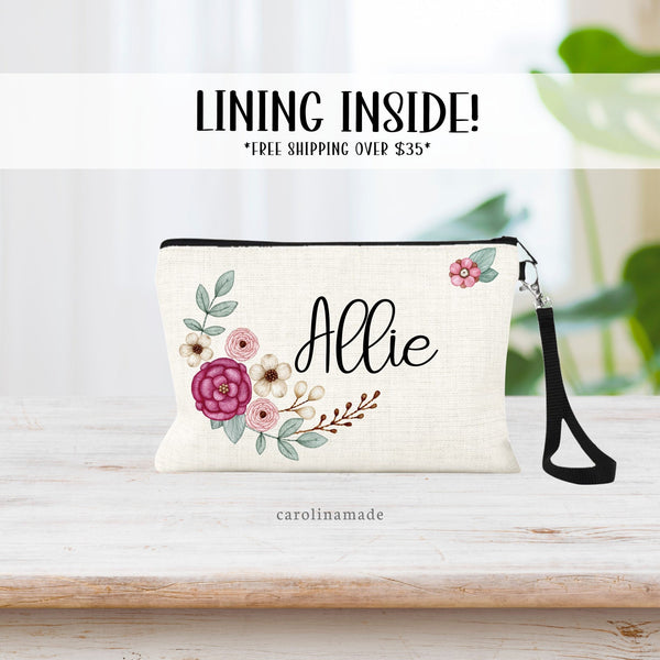 This linen bag features beautiful faux embroidered flowers, greenery and twigs and is personalized in the center with your name.