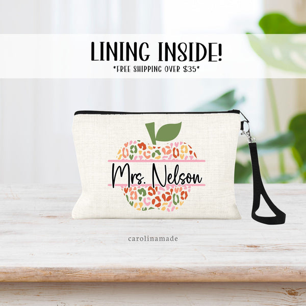 Linen wristlet with apple split to add teachers name over it. The apple is colorful cheetah print.