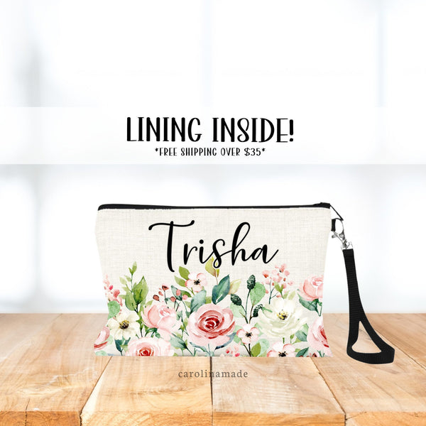 Summer roses watercolor design on wristlet / makeup bag. Perfect as a bridesmaid gift or summer wedding.