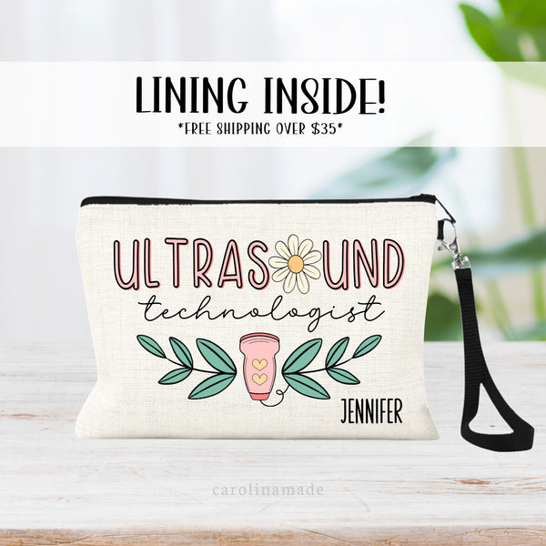 This linen zipper pouch features a fun trendy boho design in pink and green. It says ultrasound at the top with a daisy as the O. and technologist under it in script. A ultrasound wand is at the bottom with greenery & is personalized with your name.