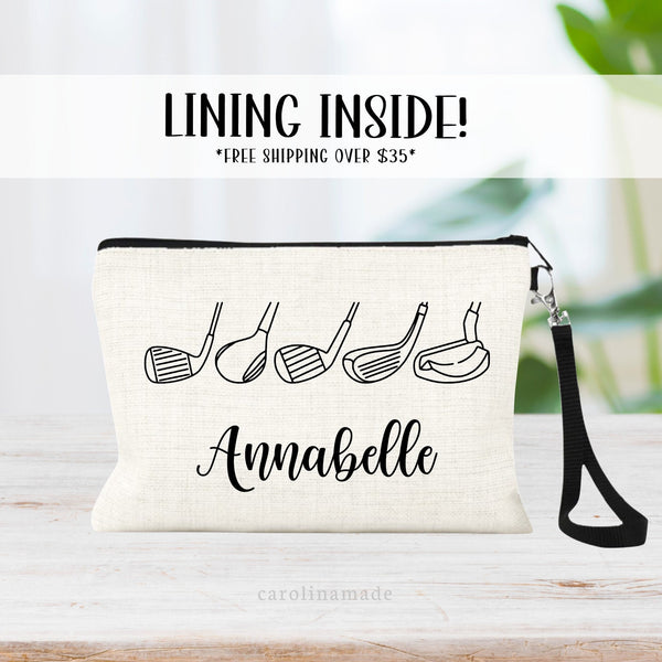 This linen zipper golf bag features a minimalist line art design with golf club heads. The pouch is personalized at the bottom with your name. Font and colors can be customized.