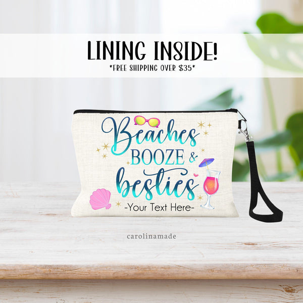 This linen zipper pouch features the text: Beaches Booze & Besties in a blue & teal printed glitter color with beach elements around the text. Sunglasses, sea shell, cocktail. Your text is personalized on the bottom of the bag.