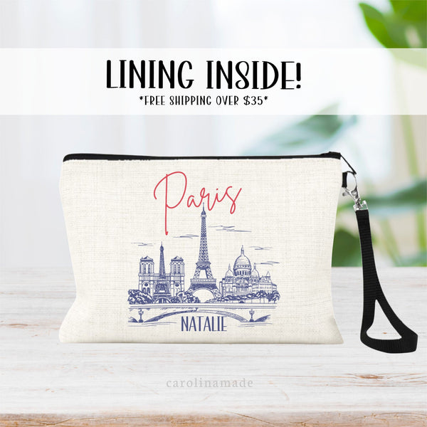 This linen zipper pouch features a line art skyline design of Paris and the Effiel Tower. It is personalized at the bottom with your name.
