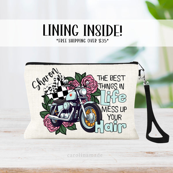 This linen zipper pouch is the perfect accessory for women who ride motorcycles! It says The Best things in life mess up your hair. And shows a motorcycle with roses and leaves. It is personalized in the corner with a name.