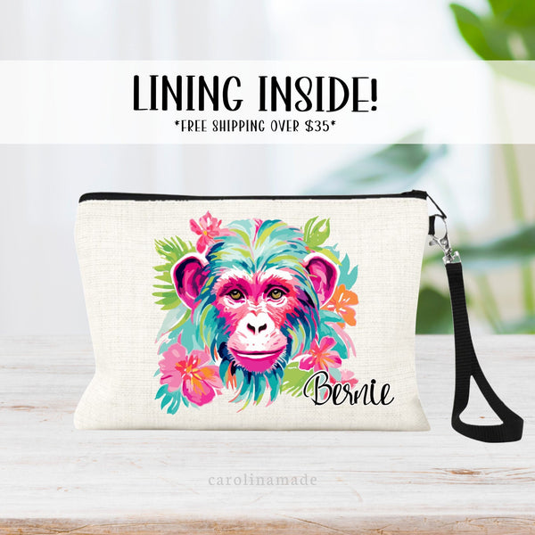 This linen zipper pouch features a pretty tropical floral and greenery design with an ape. It is personalized in the corner with your name.