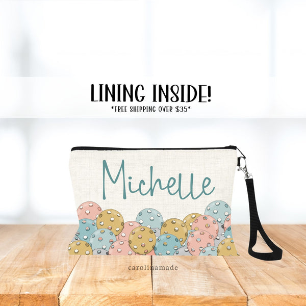Pickleball linen bag with colorful balls along the bottom. Gold, Rose, Teal. Very Boho color Vibes. Personalized with your name.