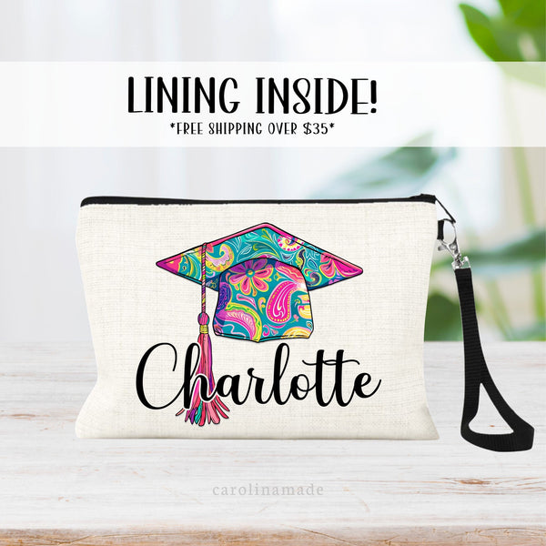 This linen zipper pouch features a pretty floral pattern design with a graduation cap and tassel. It is personalized in the with your name. Perfect for any High School or College Senior Gift!