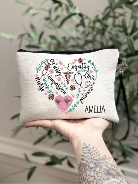 This beautiful bag has text & icons in the shape of a heart. Words like: caring, compassion, empathy, love, patience, nurse.  And the icons are flowers, greenery, bandages, needle, pills, stethoscope, medical symbol. A name is personalized in corner.