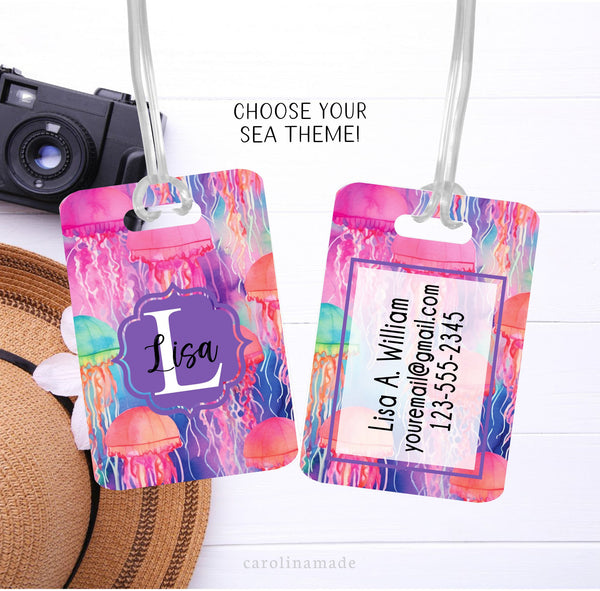 This aluminum luggage tag features a colorful preppy jellyfish design on both sides. The front has a name. And the back is personalized with contact info.