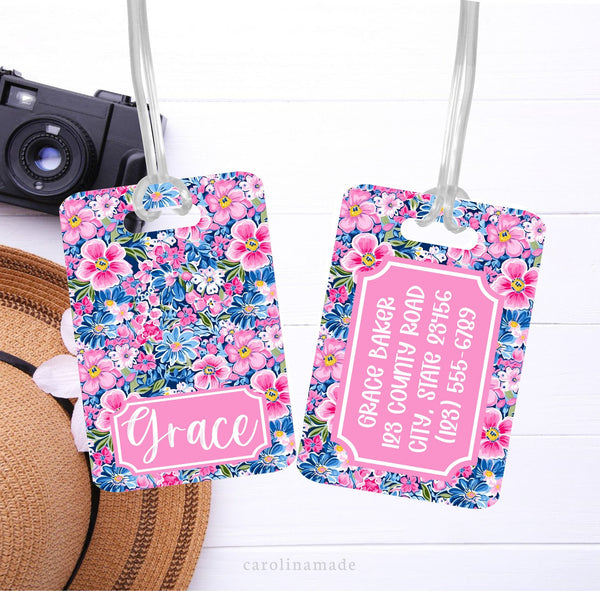 This aluminum luggage tag features a colorful preppy floral design on both sides. The front has a name. And the back is personalized with contact info.