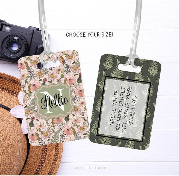 This aluminum luggage tag features a Pink flora design on one side & a green leaf design on the back. The front has a name. And the back is personalized with contact info.