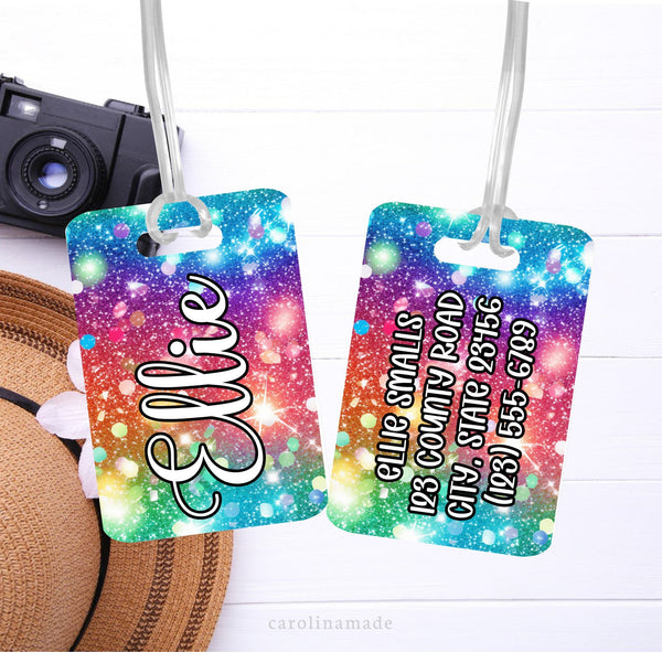 This luggage id tag features a rainbow glitter design with large  name on the front. The back is personalized with contact information.