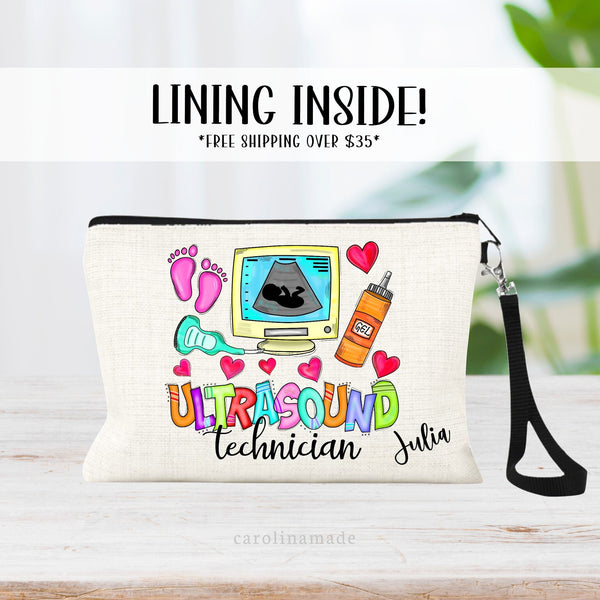 This linen zipper pouch features the text ultrasound technician with a ultrasound wand, monitor, hearts, baby feet, gel.It is personalized with your name in the corner.