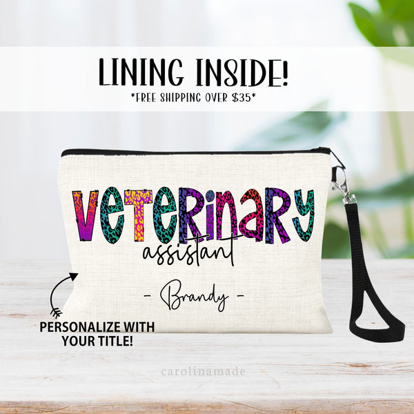 Linen makeup bag / wristlet that has the word veterinary in colorful leopard print font and a title under it. Title can be personalized for your job. Receptionist, assistant, tech, etc. Your name is at the bottom!