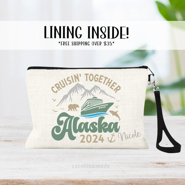This linen wristlet features a fun alaska cruise design with mountains, ship, bear & whale. It says Cruisin together alaska 2024. and is personalized with your name in the corner.