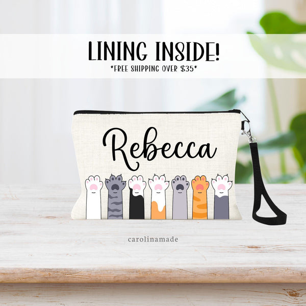 Cat paw lined in a row personalized with your name on top. Different color arms/paws. White cat, gray cat, orange cat and mixed. Perfect for makeup bag or wristlet purse
