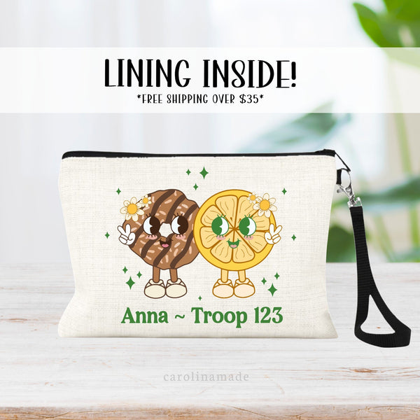 This fun linen bag features two large cookies holding a peace sign and has a smiley face. With the bottom personalized with your girls name and number. perfect for cookie selling money collection.