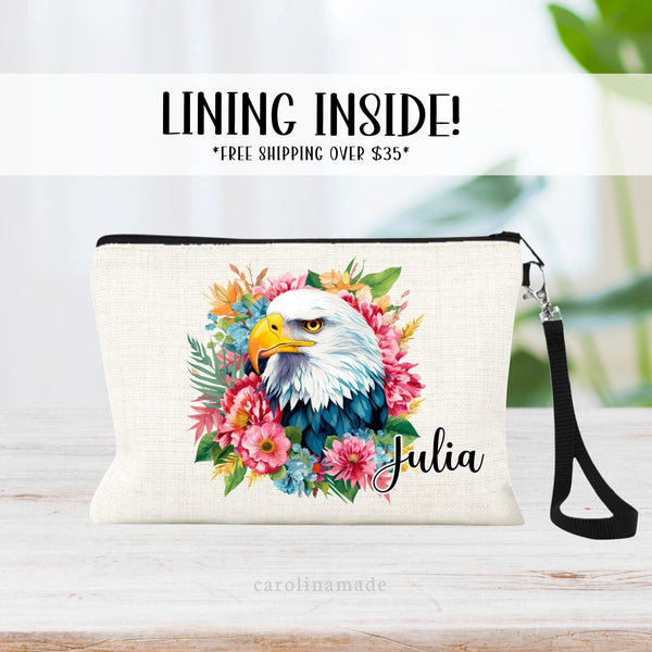 This linen zipper pouch features a pretty tropical floral and greenery design with an eagle in the center. It is personalized in the corner with your name.